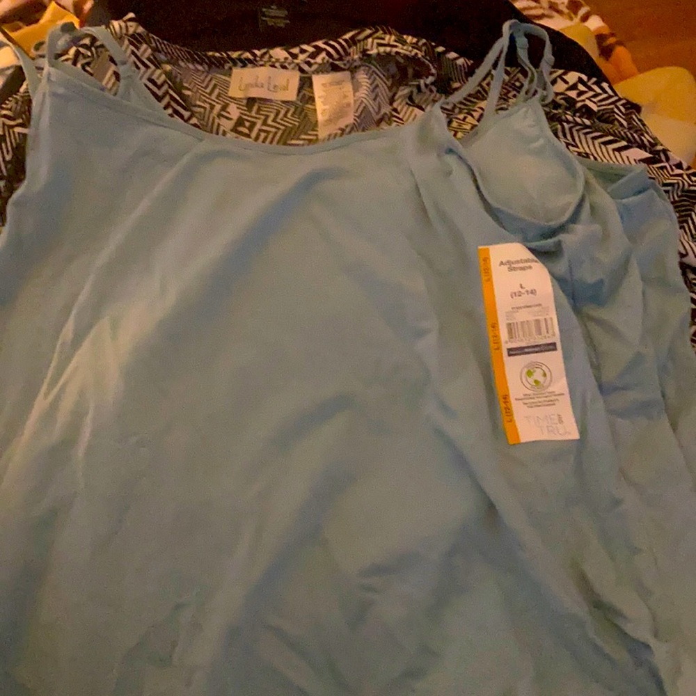 Two Tank tops.  Light blue.  Never worn.  Simple.
